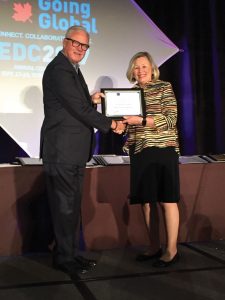 Diane Schwenke accepts the Bronze Excellence in Economic Development Award for the "Celebrating Colorado’s Grand Valley" video campaign.