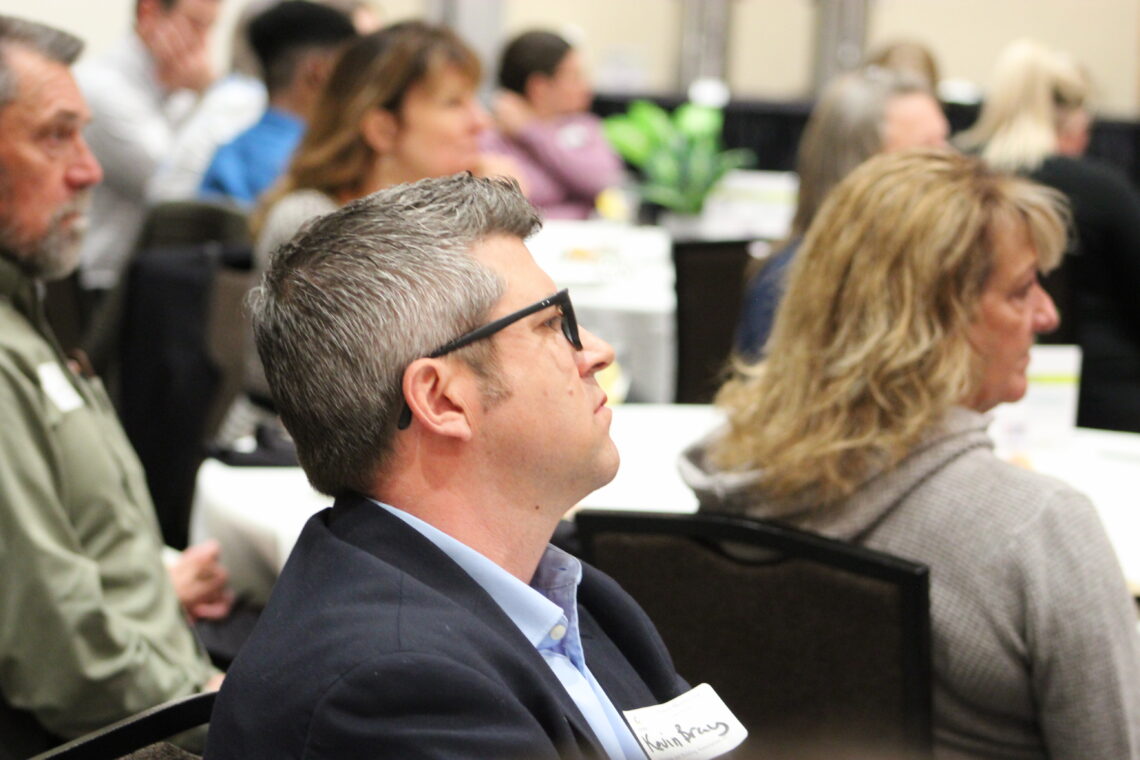 Guest listens to 2023 Spring Candidate Forum