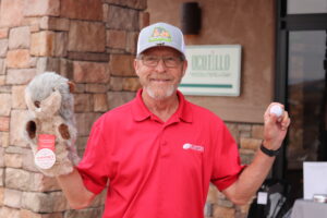 Diplomat at golf tournament