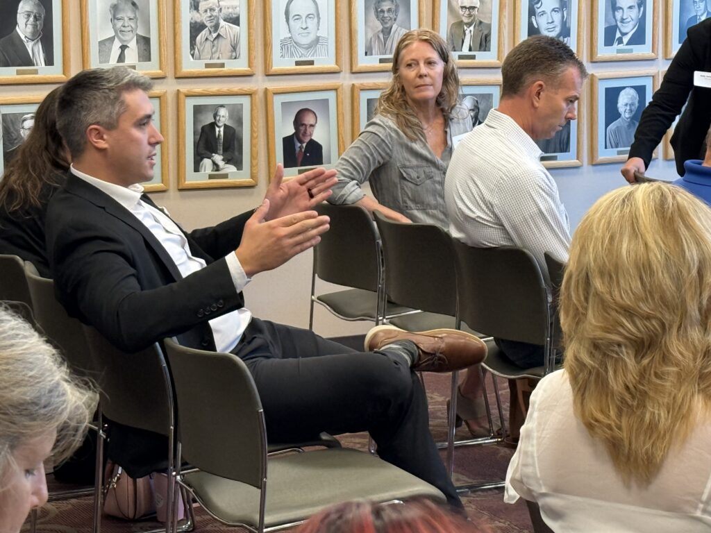 A community member speaks up at the Business Competitiveness breakout session